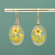 In Bloom Drop Earrings with Real Yellow Flowers encased in clear resin styled