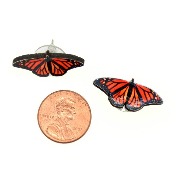 Laser Cut Stud Earrings - Butterfly next to penny for size comparison