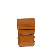 The Boxy Crossbody in Camel Leather front view with flap tucked in