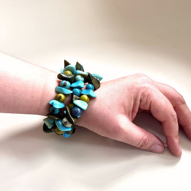 Tagua and Acai Bead Spiral Bracelet - Blue Green on model