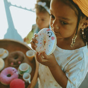 Organic Friendly Doughnut Rattle White with little girl