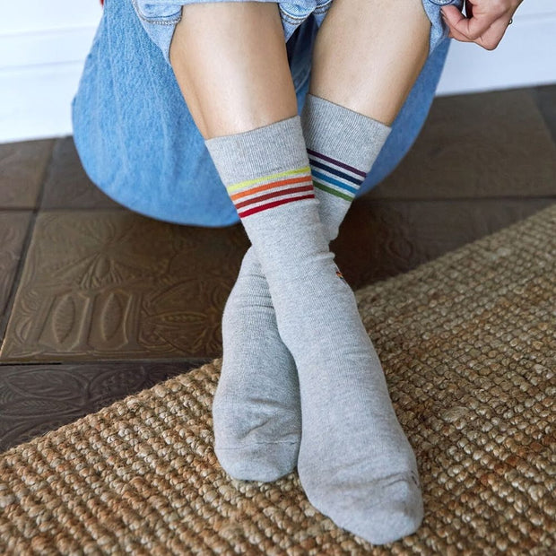 Socks that Save LGBTQ Lives - Grey on model