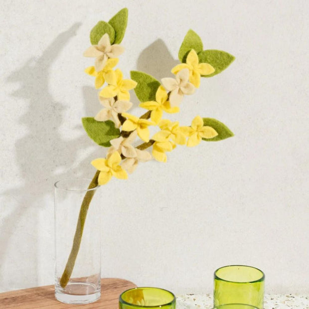 Felt Forsythia Flower Stem in a clear glass vase