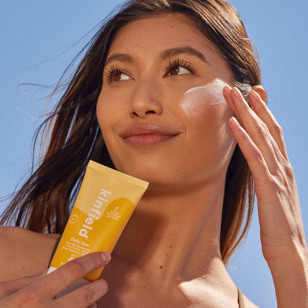 Kinfield Water-Resistant Hydrating Face Sunscreen on model