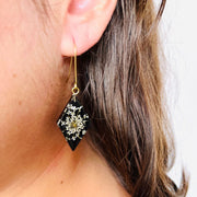 Resin Rhombus Earrings with Queen Anne Flowers on Black base on model