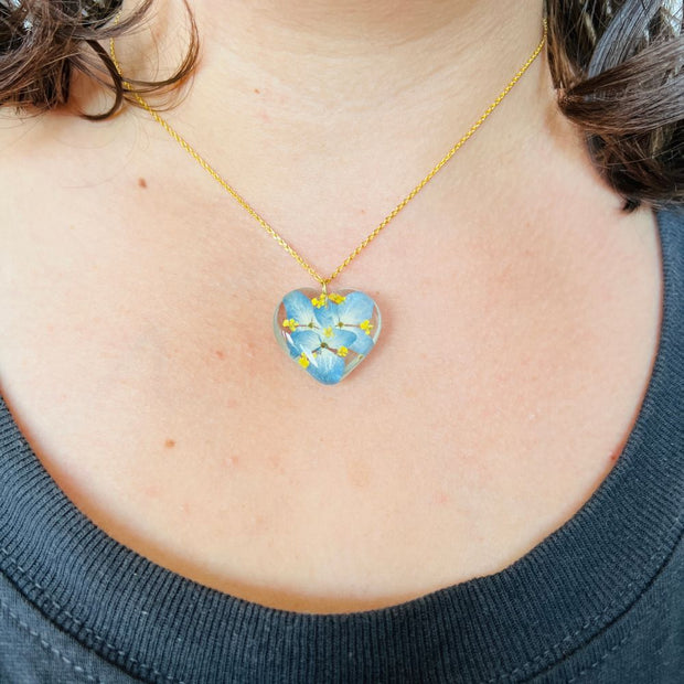Love for Ukraine Clear Resin Heart Pendant Necklace on model