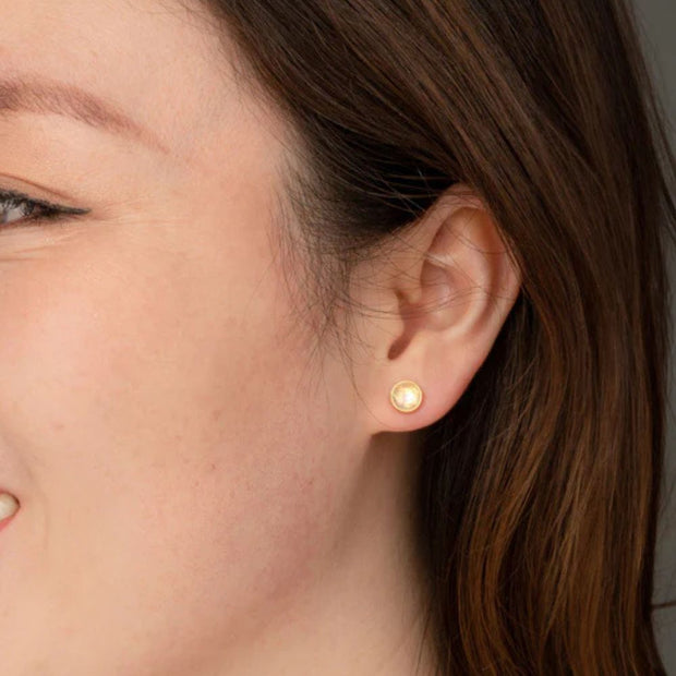 Mina Gold and Opal Stud Earrings on model