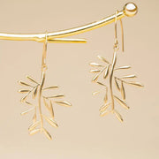 Rooted and Rising Branch Earrings styled