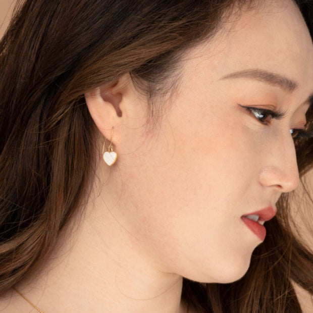 Azure Heart Earrings in Mother of Pearl on model