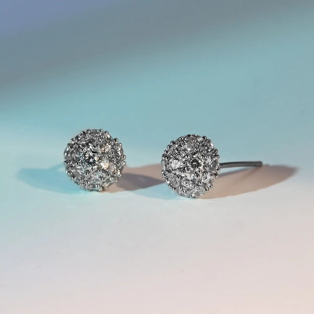 Lustre Bloom Studs in Platinum on gradient background