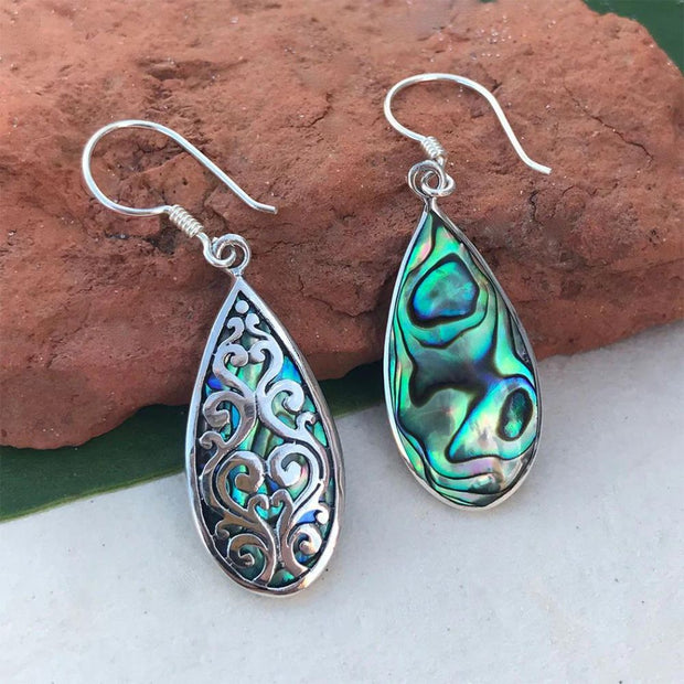 Burung Sterling Silver Scroll Overlay on Abalone Teardrop Earrings showing the back of one