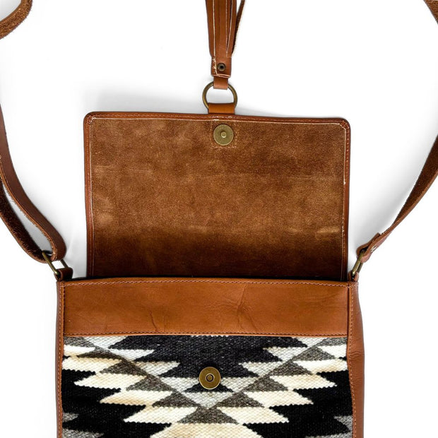 Heritage Tapiz-style Weave and Leather Crossbody Bag open to show magnetic closure and tassel