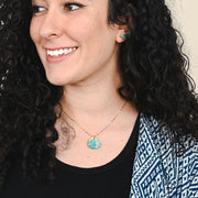 Hope Restored Heart Shaped Turquoise Pendant Necklace on a model