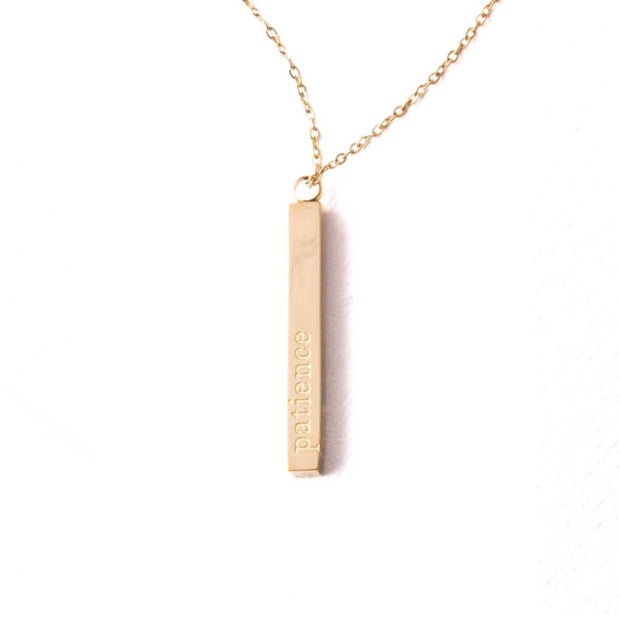 Strength Bar Necklace displaying the word patience