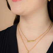 Mama Gold Bar Necklace on model