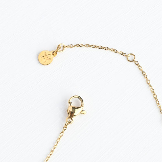 Perfect Harmony Gold Cross Necklace chain closure detail