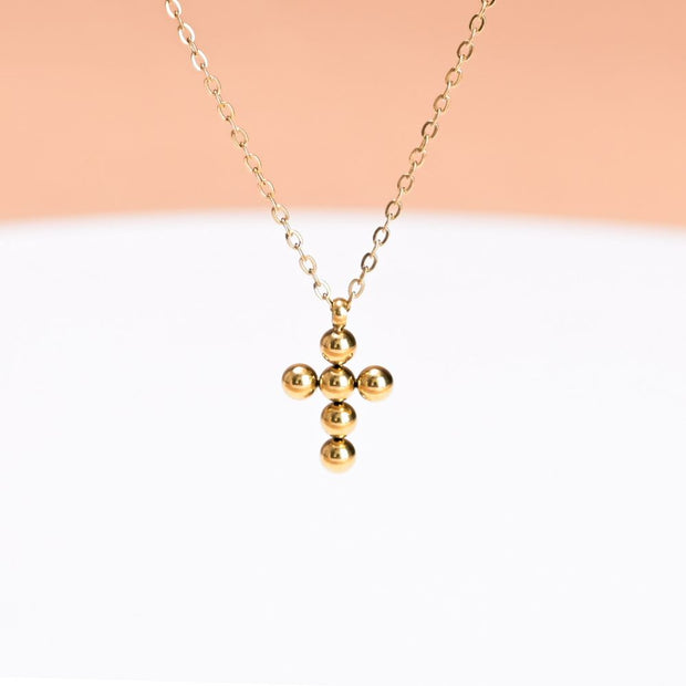 Perfect Harmony Gold Cross Necklace closeup