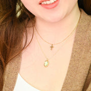 Perfect Harmony Gold Cross Necklace on model