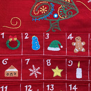 Hand-embroidered Christmas Countdown Advent Wall Calendar closeup to show pocket detail