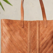 Large Riya Leather Tote showing chevron and laced accent in front