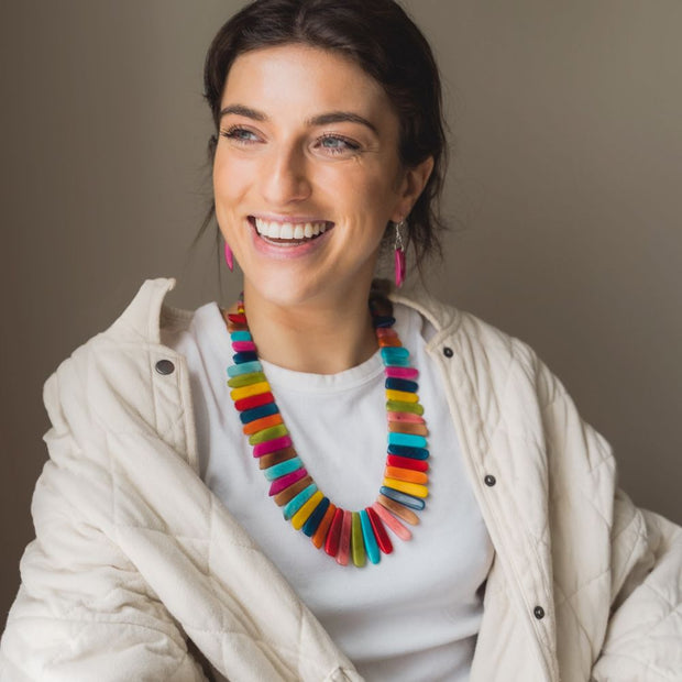 Woman wearing a colorful Mundo Tagua Statement Necklace