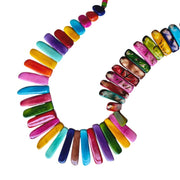 Colorful necklace with multicolored tagua nut pieces showing front and back of each for a versatile look