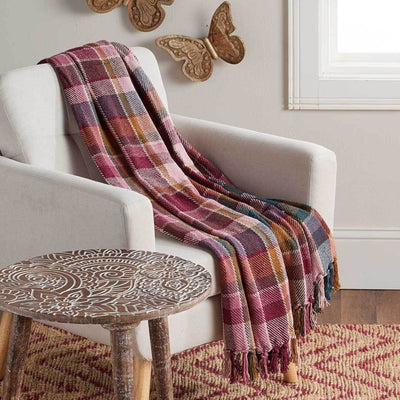 76" x 60" Rethread Blanket with fringes in Lake Tahoe Plaid design draped over an upholstered chair