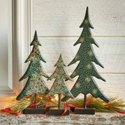 Set of 3 Wooden Batik Christmas Trees displayed on a mantel with holiday charm