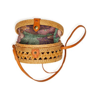 Matahari Rattan Round Crossbody Bag interior showing batik cotton lining