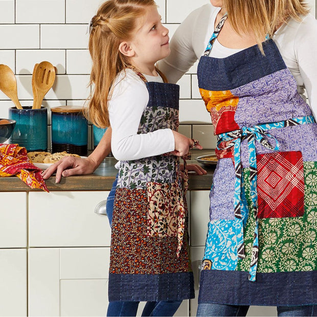 Little Cook's Upcycled Sari & Denim Apron on child model