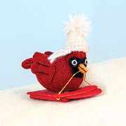 Felt Sledding Cardinal with a Winter Hat Ornament styled