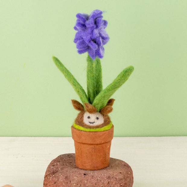 Potted plant decor piece featuring a felt purple hyacinth in bloom lifestyle