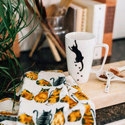 Kitty Prints Ceramic Tall Mug styled on kitchen counter