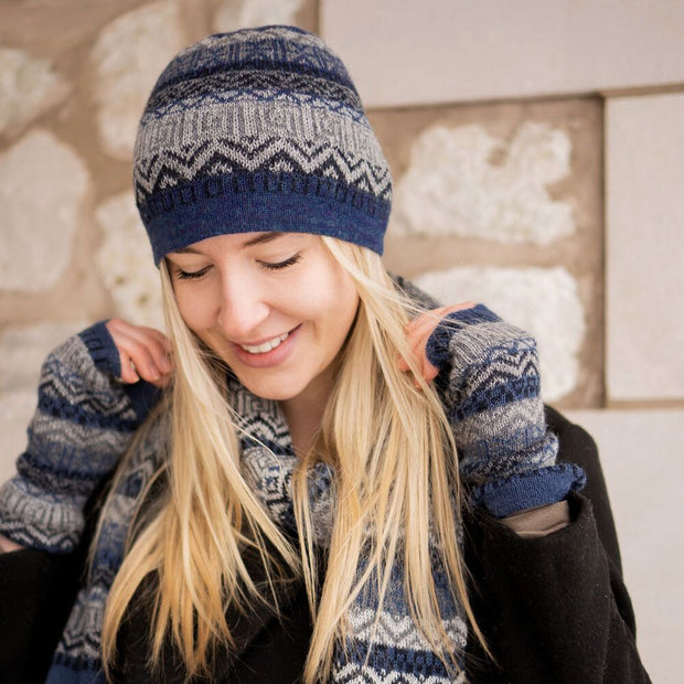 Woman wearing a Patterned 100% Baby Alpaca Knitted Beanie Hat in blue