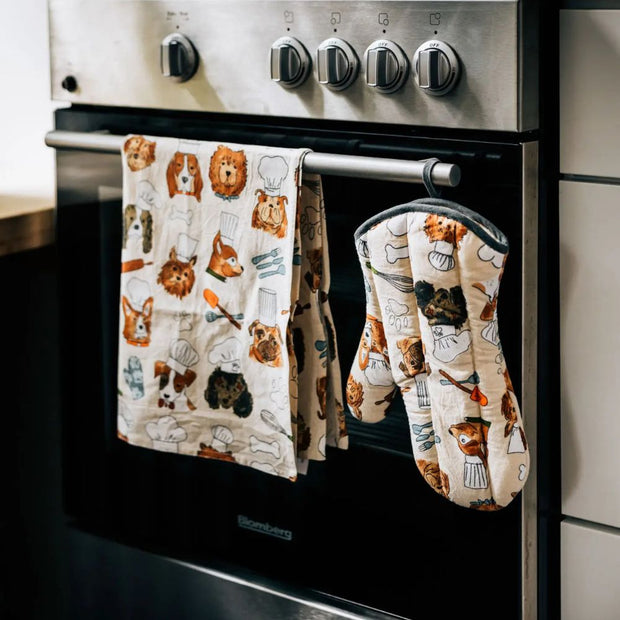 Dog Chefs Tea Towel shown with a Dog Chefs oven mitt