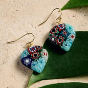 Heart Shaped Raza Murano Millefiori Drop Earrings styled on textured surface