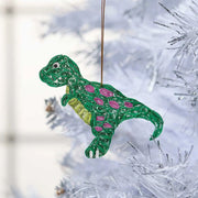 T-Rex Quilled Paper Ornament hanging from a holiday tree