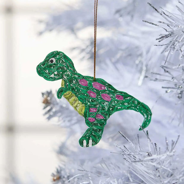 T-Rex Quilled Paper Ornament hanging from a holiday tree