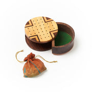 Travel Size Wood Peg Solitaire Game with storage drawer open and showing sari pouch with peg pieces