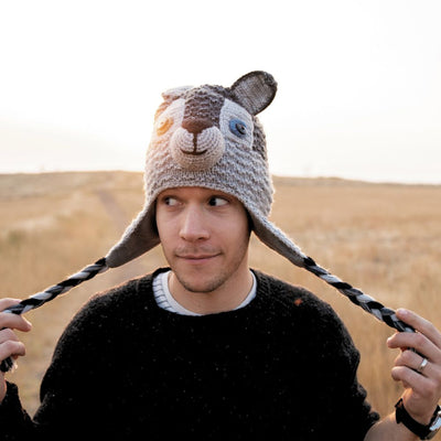 Person wearing a Adult Hand-knit Animal Face Hat depicting a Wolf