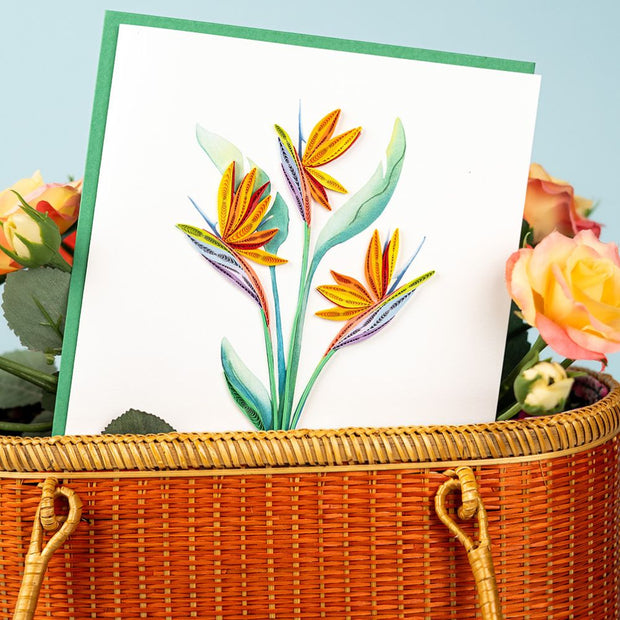 Quilled Bird of Paradise Greeting Card styled with flowers and a basket