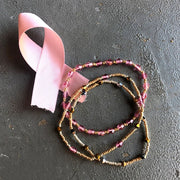 Cause Connection Bracelet - Fight Cancer uncarded with pink ribbon