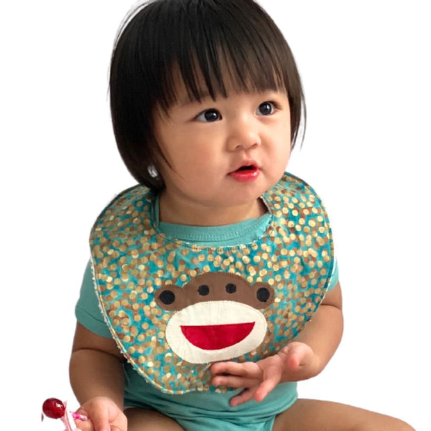 Cotton Batik with Monkey Applique Bib on baby