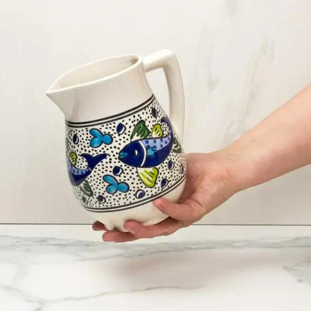 Blue Fish Hand-painted Ceramic Pitcher held by model