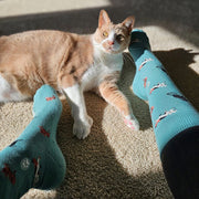 Conscious Step socks that save cats featuring frisky felines on model