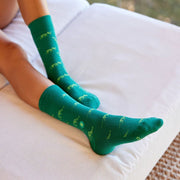 Conscious Step Socks That Give Books - Green Dino Bones on model