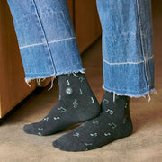 Conscious Step Gift Box - Socks That Support Music on model showing one design