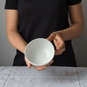 Stoneware Cereal Bowl Dadasi 10 oz Matte White held by model
