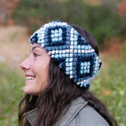 Model wearing a Diamond Hand-knit headband in Nordic colors