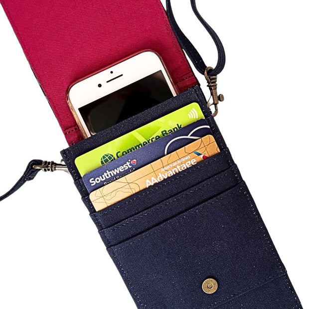 Crossbody Phone Case Wallet in Geometric Navy screen printed design open showing credit card slots and lining